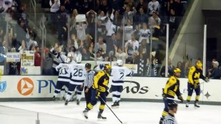 Penn State ice hockey's Casey Bailey celebrates his goal against Michigan