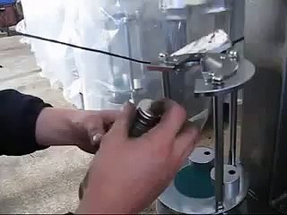 Máy siết nắp chai thuốc si rô, chai rượu, chai mật ong bán tự động JGS 980