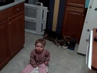 baby riding roomba