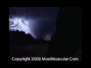 Deadly tornado illuminated by lightning