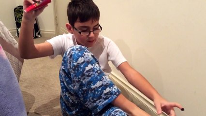 Painting my toe nails with shoe polisher!