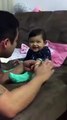 He was cutting his baby nails but his baby reaction made him Mad