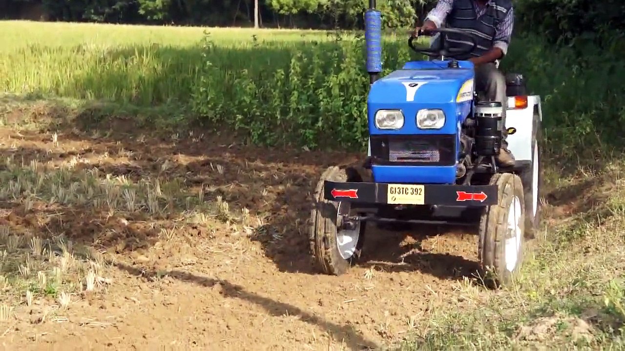 Farmer Mini Tractor working with rotavator