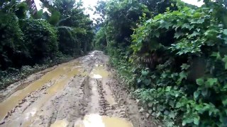 BMW F650GS offroad on muddy road in Vietnam 02