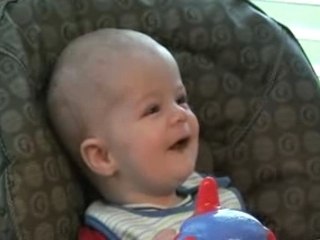 Peyton eating green beans