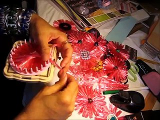 tutorial como hacer una flor de rafia.wmv