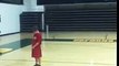 USF basketball player dunks over little kid