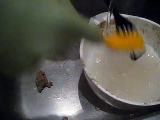 Washing-up in Rubber Gloves after Baking