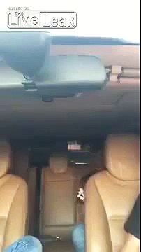 LiveLeak - Leaking Gas Catches Fire In Car Due To Combustion Gas Catches People Head On Fire WTF