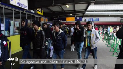 Migrants arrive in Munich, as Europe prepares to support rallies