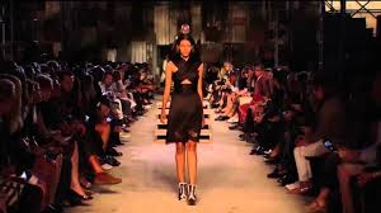 Models Candice Swanepoel & Pooja Mor fall down during Givenchy Spring _ Summer 201