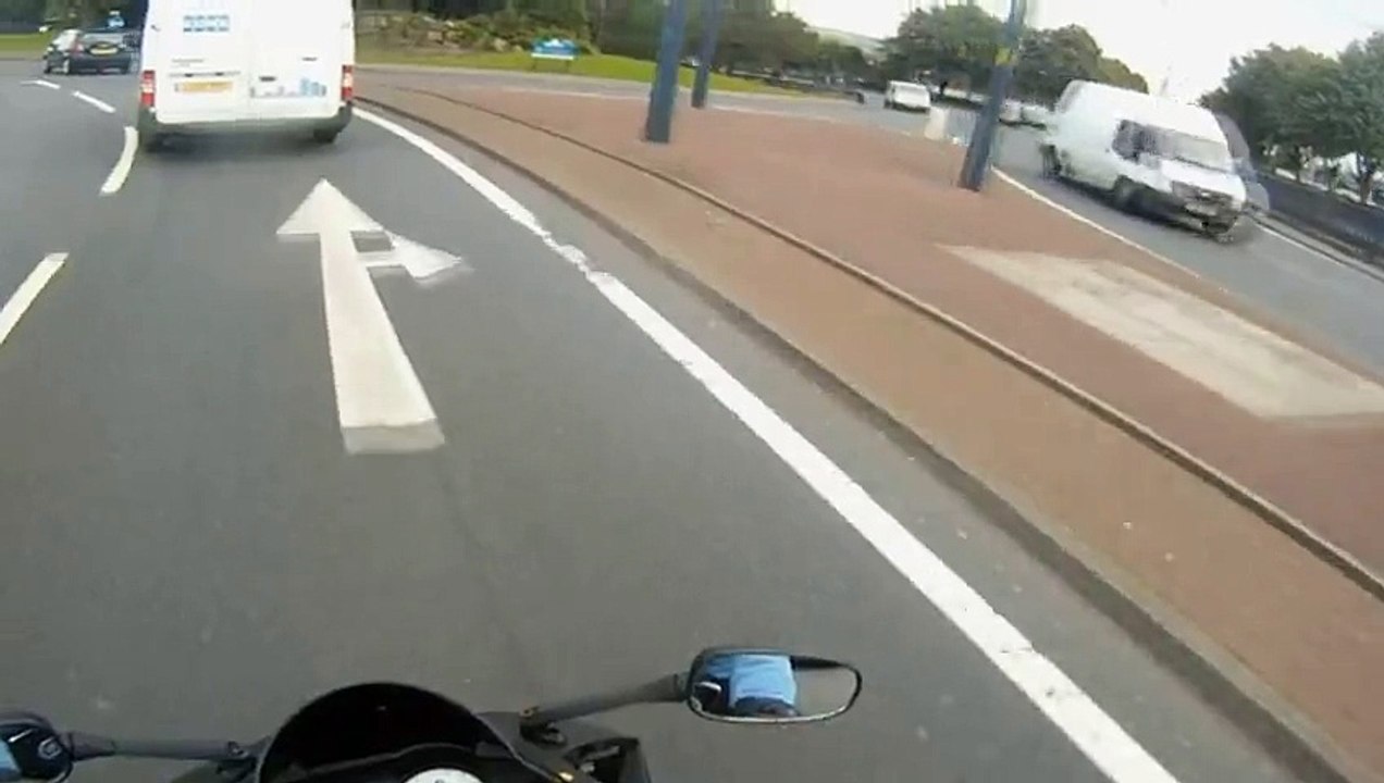ROAD Accident- Motorcycle Crashes Into Car At Roundabout