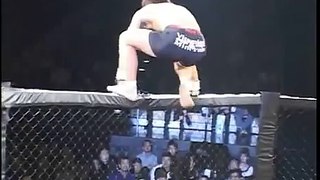 MMA Backflip Fail Off The Cage!