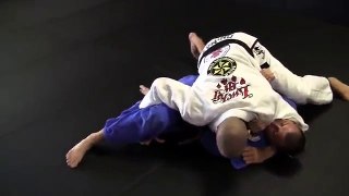 Rafael Lovato Jr. shows a triangle from side control