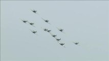 Incredible sight of 11 Spitfires and a Hurricane flying at Battle of Britain Commemoration.