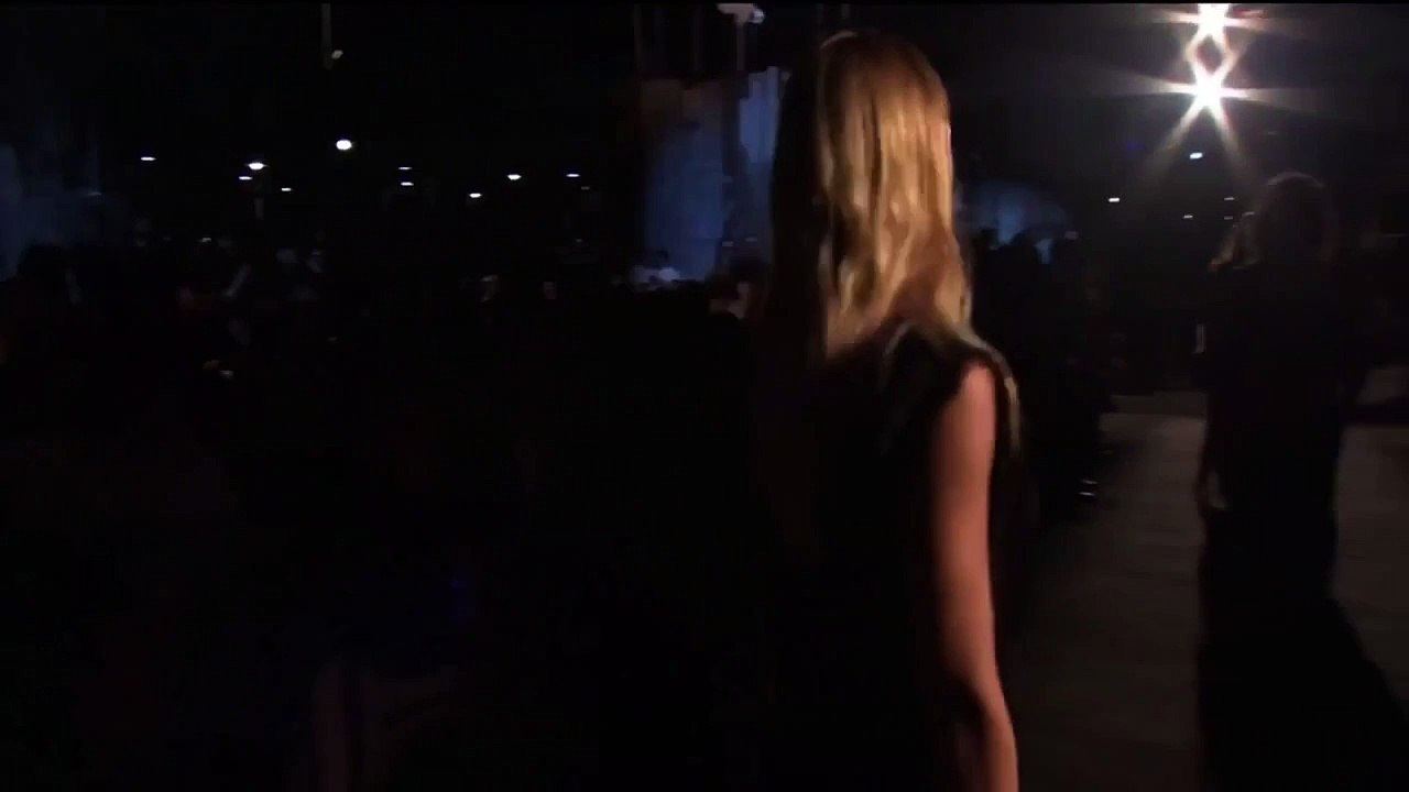 Models Candice Swanepoel & Pooja Mor fall down during Givenchy Spring/Summer 2016 fashion show