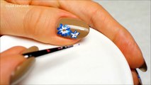 Nail Art. Nude Nails. Blue Flowers.