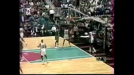 Moses Malone hits a full court shot at the buzzer