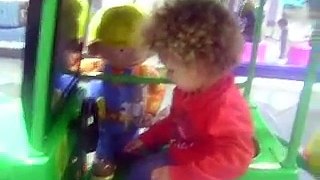 Imasuen the cutest kid in the world taking a ride in Galway shopping mall