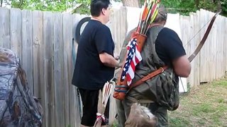 Teaching Native American Indian How to shoot The Bow