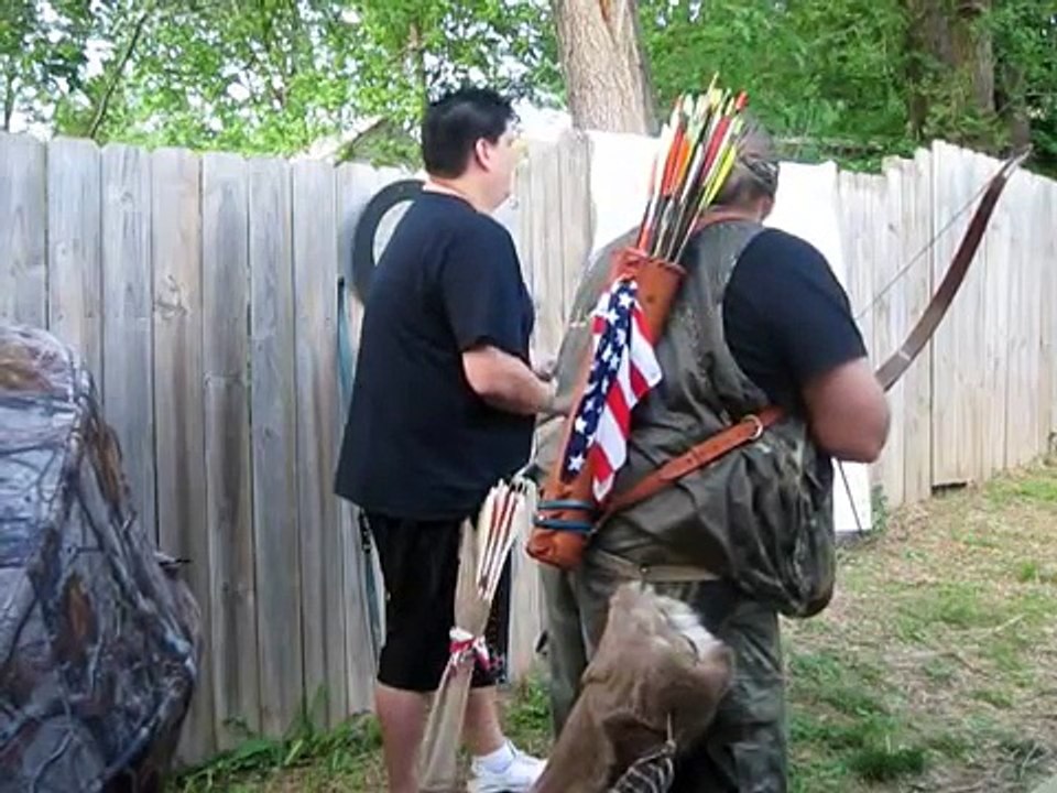 Teaching Native American Indian How to shoot The Bow