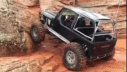 Jeep climbs almost 90 degrees Rock Wall straight up