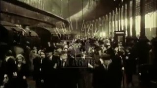 1930's London railways.  Commuters and steam trains.  Film 34031