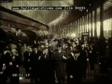 1930's London railways.  Commuters and steam trains.  Film 34031