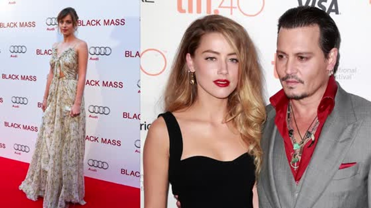 Dakota Johnson und Johnny Depp bei der TIFF Black Mass Premiere