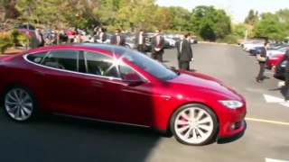 Elon Musk takes Japan's Prime Minister for a spin 2015