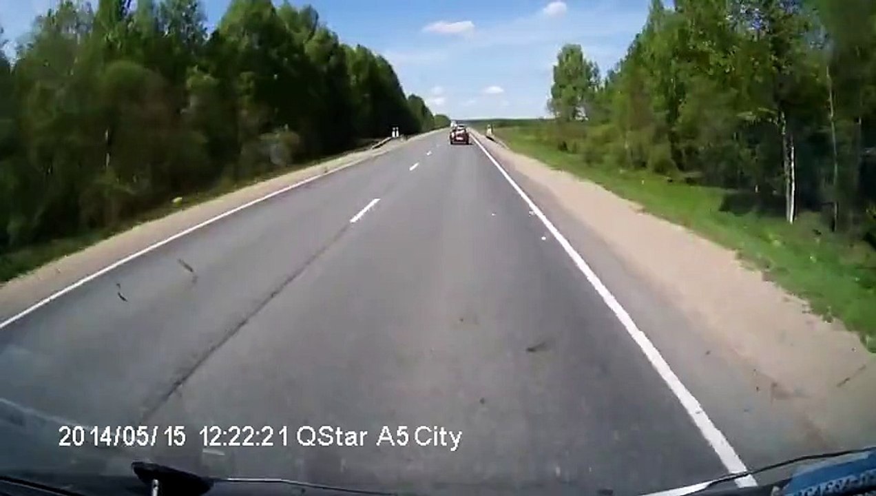Lucky car driver opposite truck loses its wheel