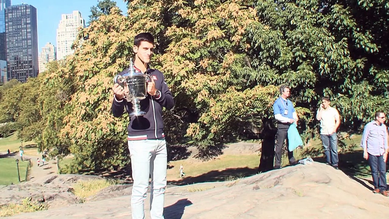 Djokovic basks in Flushing Meadows glory