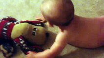 Brody-four-months-old-playing-with-his-pound-