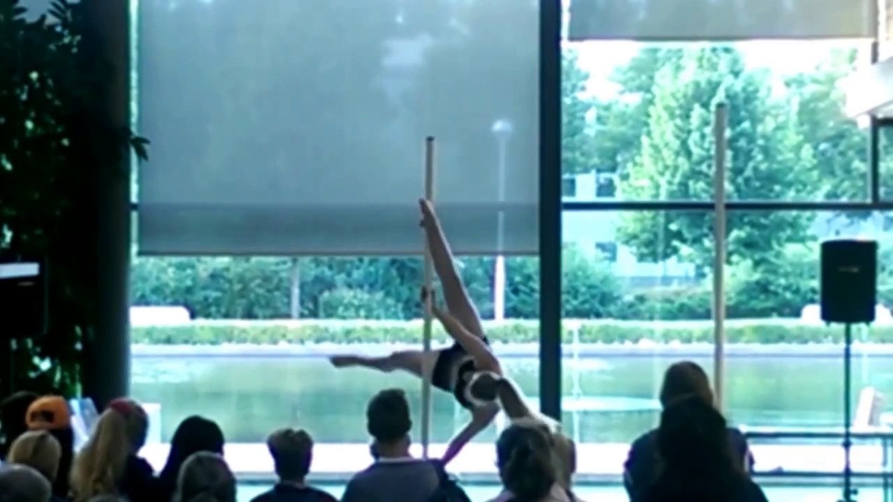 Pole dancing performance in public library