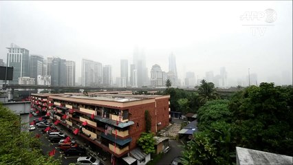 Kuala Lumpur dans le brouillard à cause de feux de forêts en Indonésie
