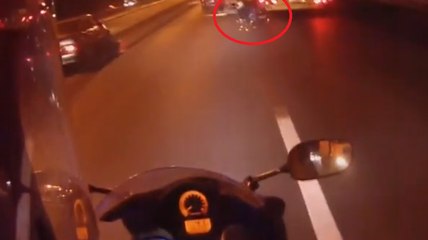 Biker Gets Pulled Under Massive Truck