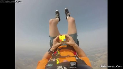 IMPRESIONANTE ABILIDAD PARA ARMAR UN CUBO DE RUBIK MIENTRAS SE AVIENTA DESDE UN AVION EN TIEMPO RECORD SEPTIEMBRE 2015