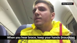 Cet homme filme ce qu'il se passe à l'interieur d'un avion pendant un atterrissage d'urgence