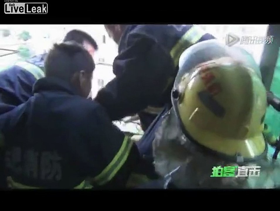 Chinese woman rescued from balcony after suicide attempt