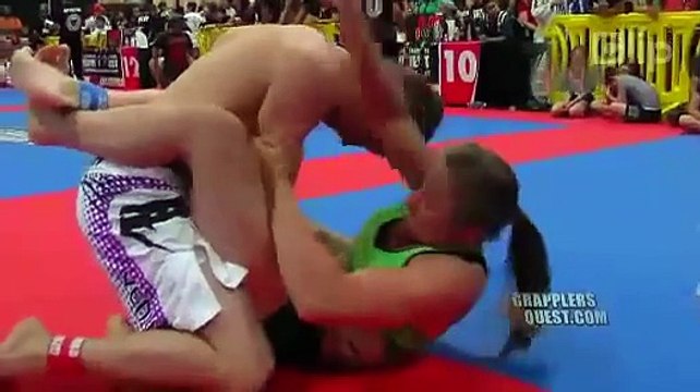 female wrestler defeated male colleagues