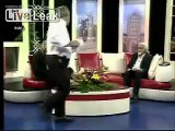 News station worker panics when he realizes he's on live TV