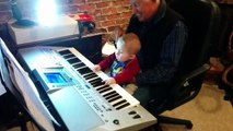 My GrandFather is showing my 7 months son how to play the piano for the first time