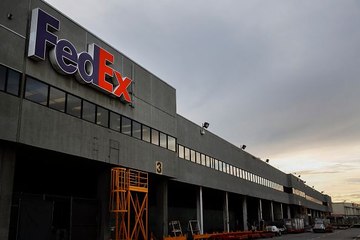 FedEx cuts profit forecast on weaker truck-shipping demand