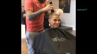girl getting her hair buzzed