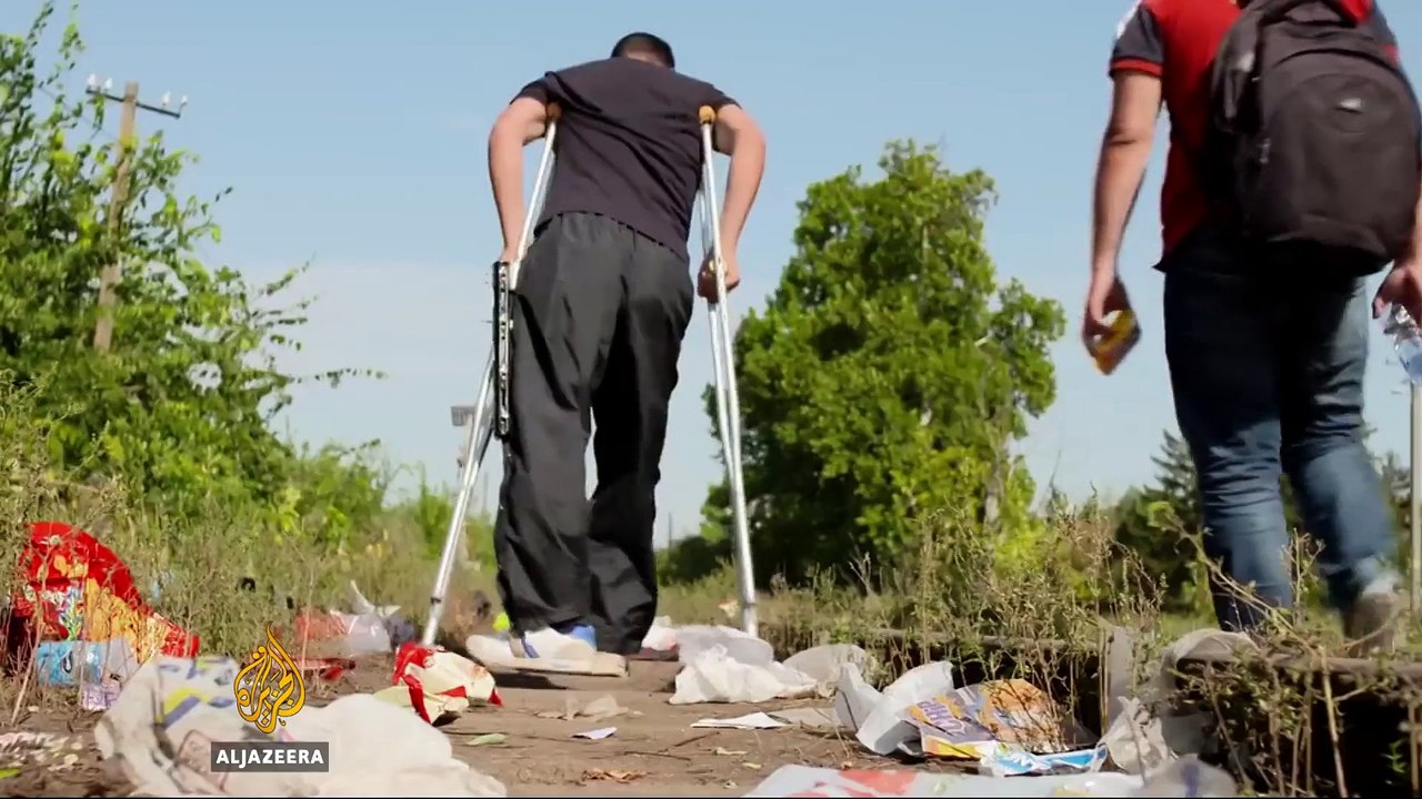 Chaotic scenes at Hungary border as police fire tear gas at migrants