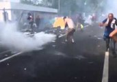 Hungarian Police Use Tear Gas and Water Cannon on Refugees