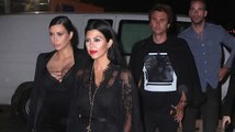 Kim Kardashian Struggles To Contain Her Cleavage During Fashion Week