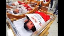 Hospitals spread holiday cheer for new parents by delivering newborns in giant Christmas stockings
