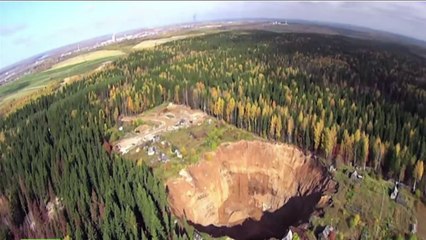 Drone Buzzes Ever-growing Sinkhole In Russia