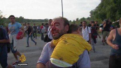 Tear gas, water cannons used on asylum seekers in Hungary
